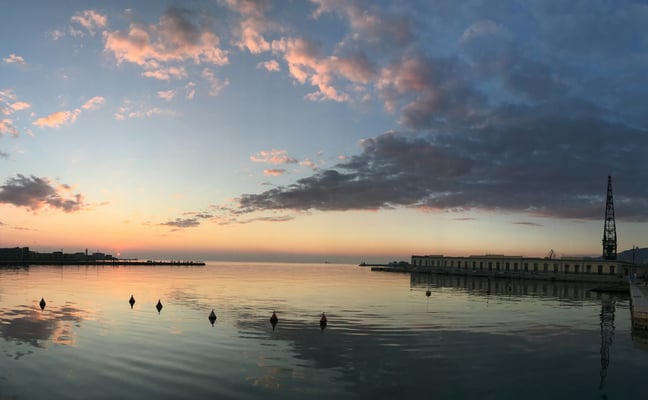 Harbor with boats at sunset